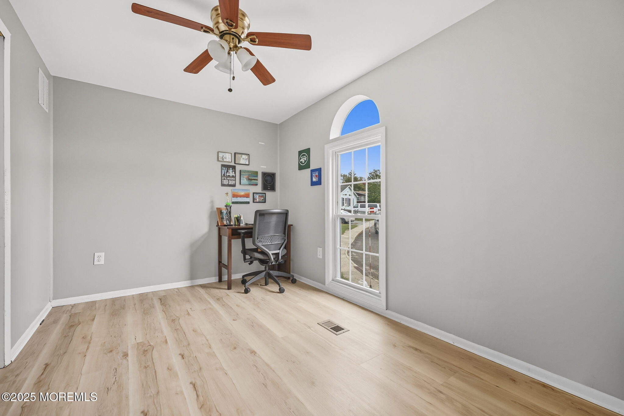 12 Alydar Court Howell, NJ 07731 - Photo 17 of 24 a view of a workspace with furniture and a chandelier fan
