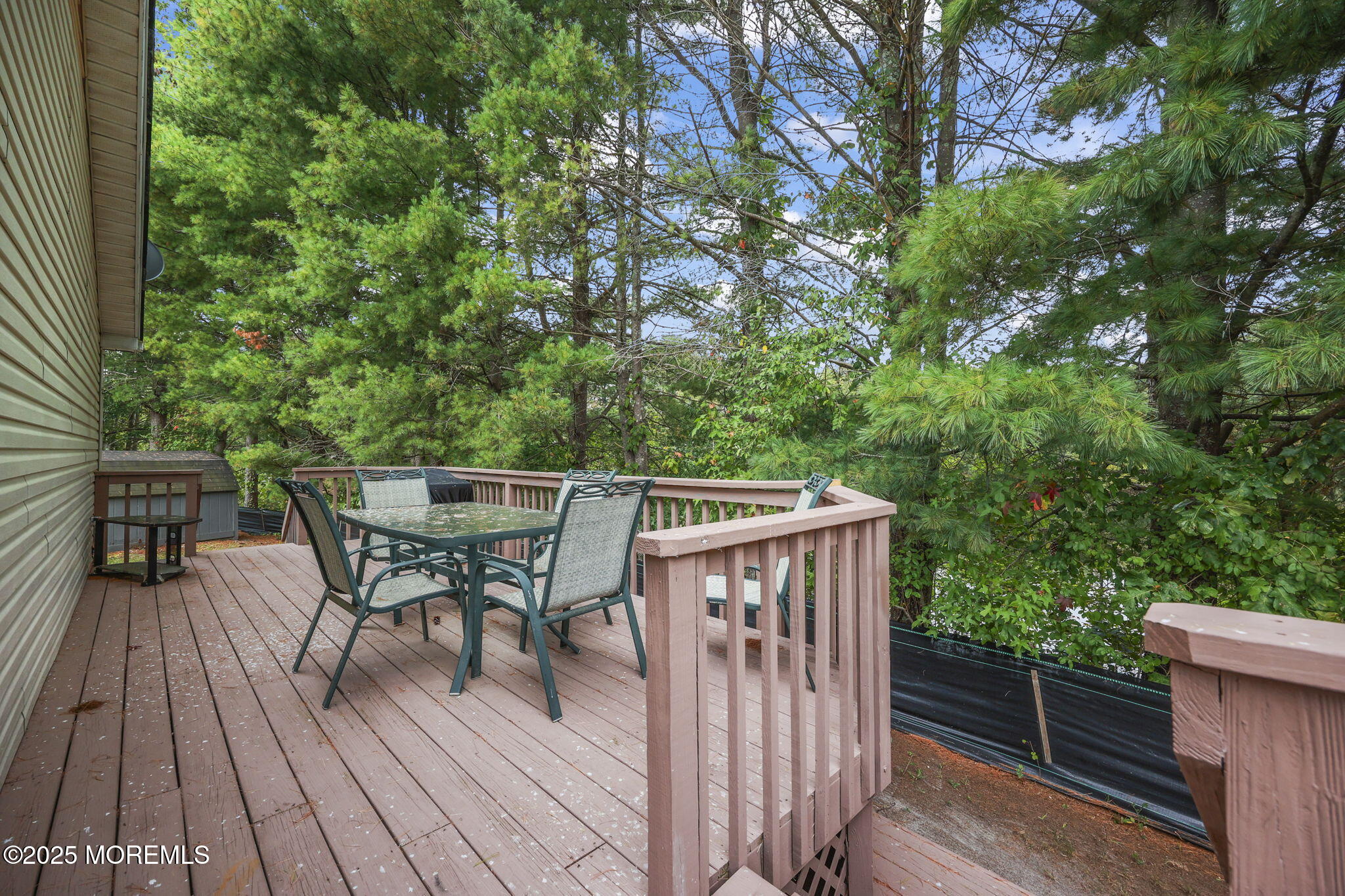 12 Alydar Court Howell, NJ 07731 - Photo 18 of 24 a balcony with wooden floor and outdoor seating