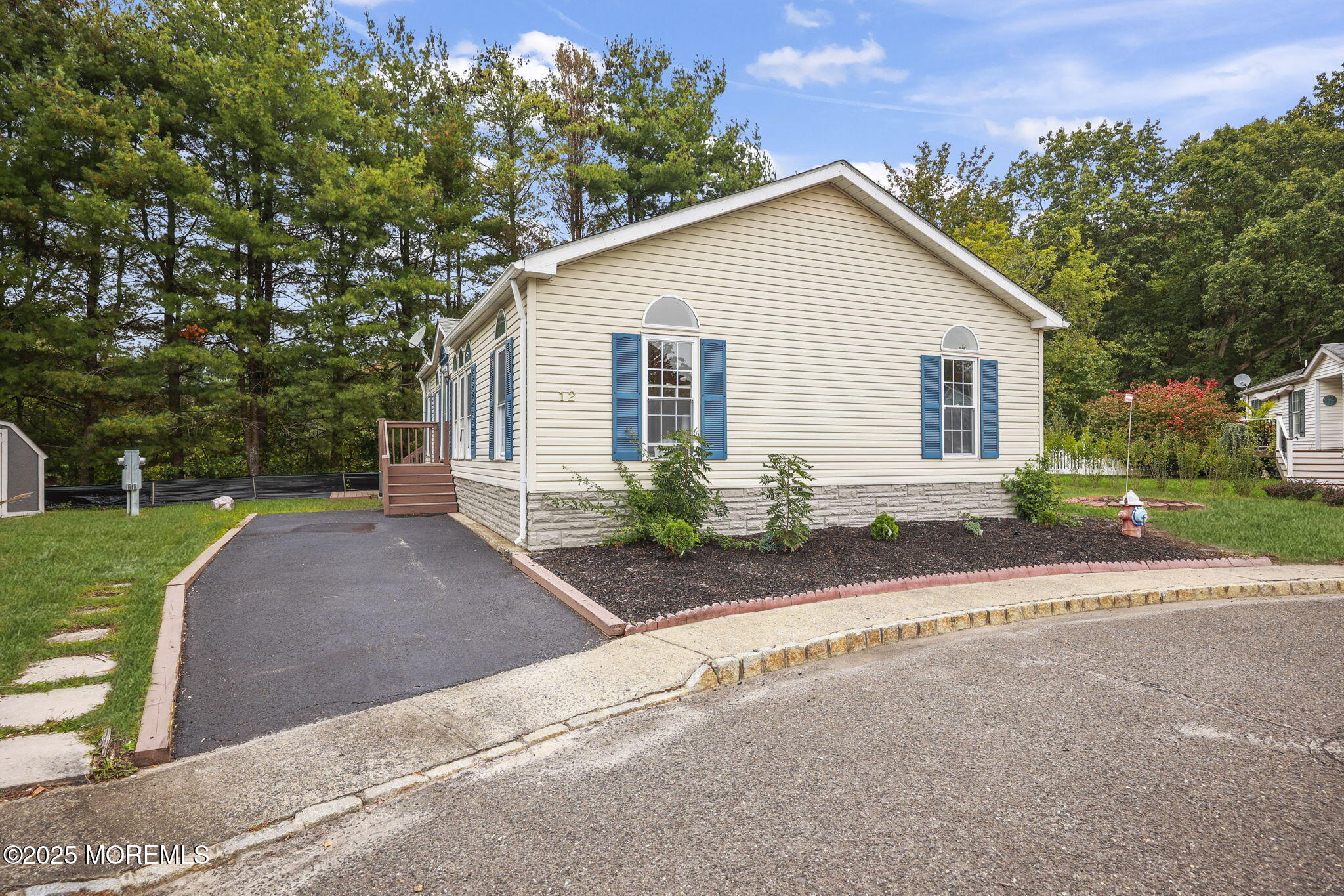 12 Alydar Court Howell, NJ 07731 - Photo 2 of 24 a view of a house with a yard and large tree