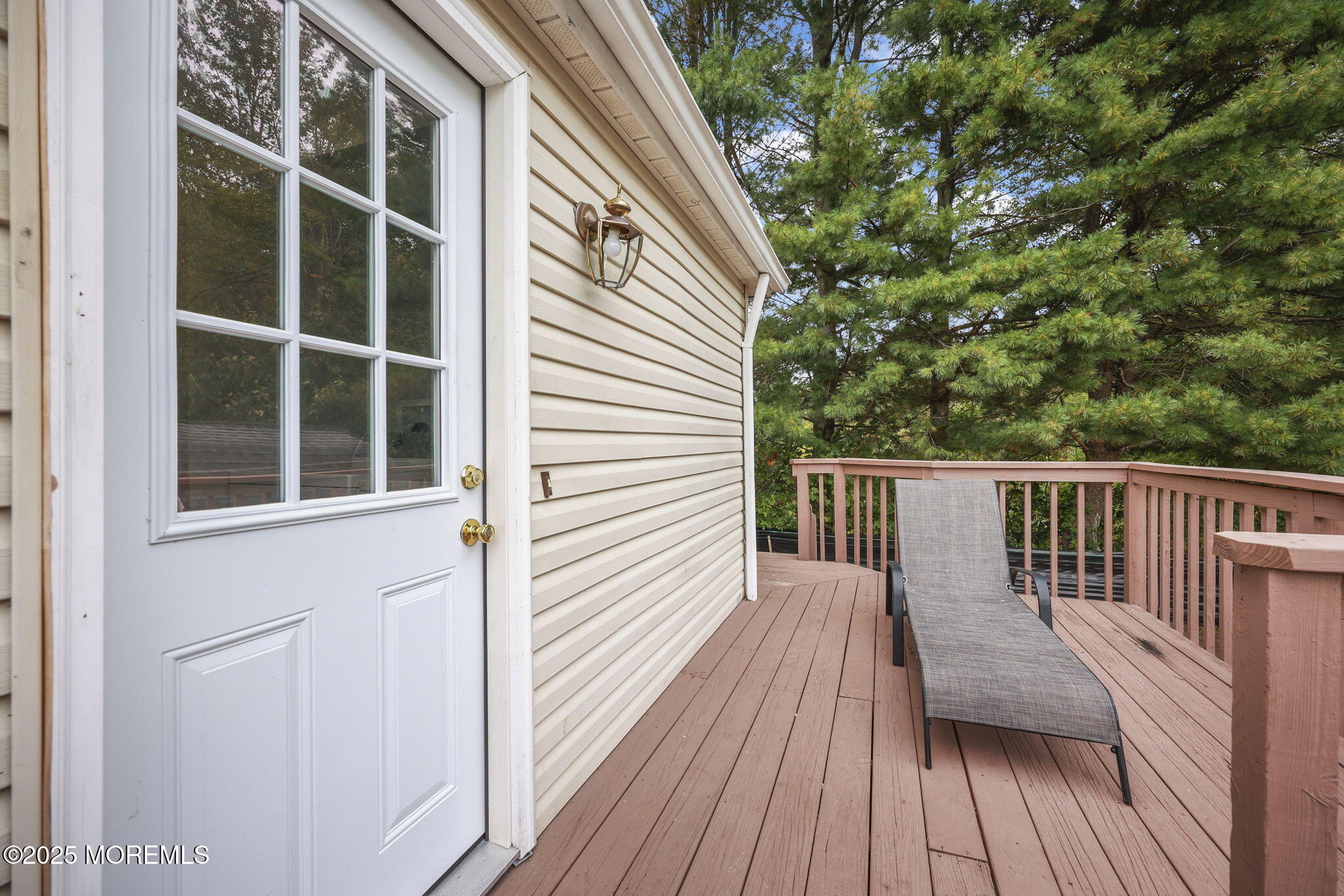 12 Alydar Court Howell, NJ 07731 - Photo 21 of 24 a view of balcony with wooden floor and fence