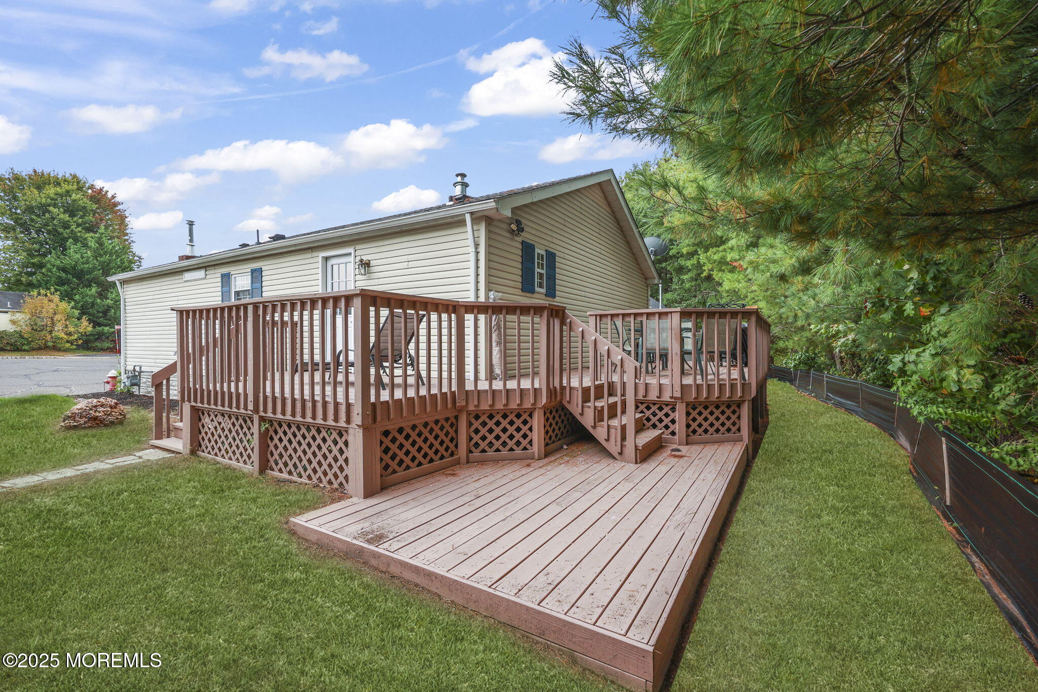 12 Alydar Court Howell, NJ 07731 - Photo 23 of 24 a view of a deck with a yard