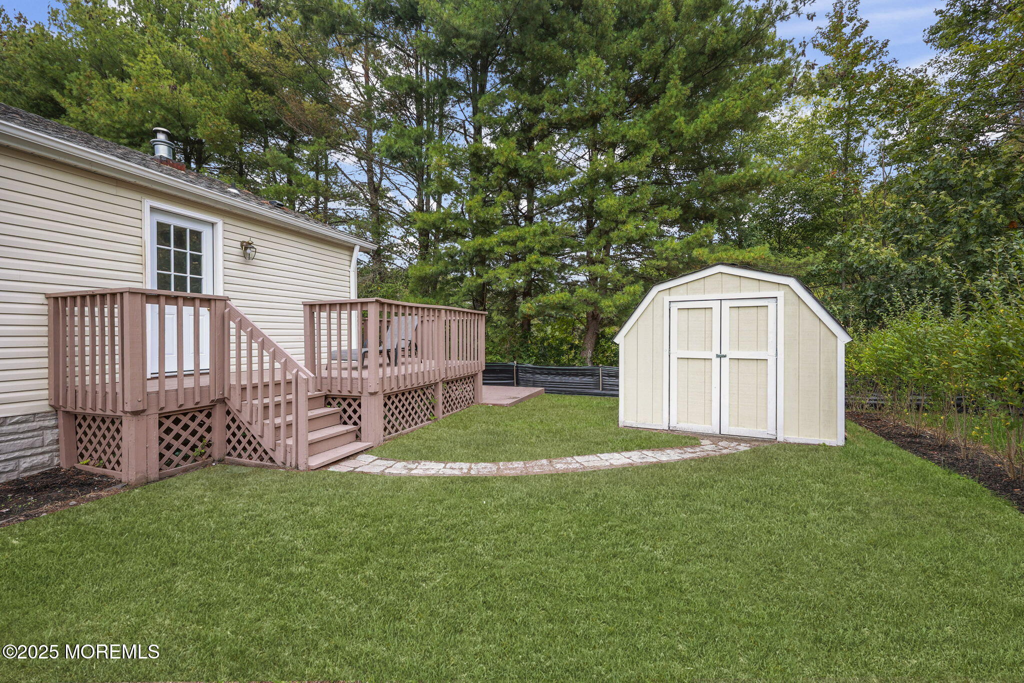 12 Alydar Court Howell, NJ 07731 - Photo 24 of 24 a view of a house with a yard and sitting area