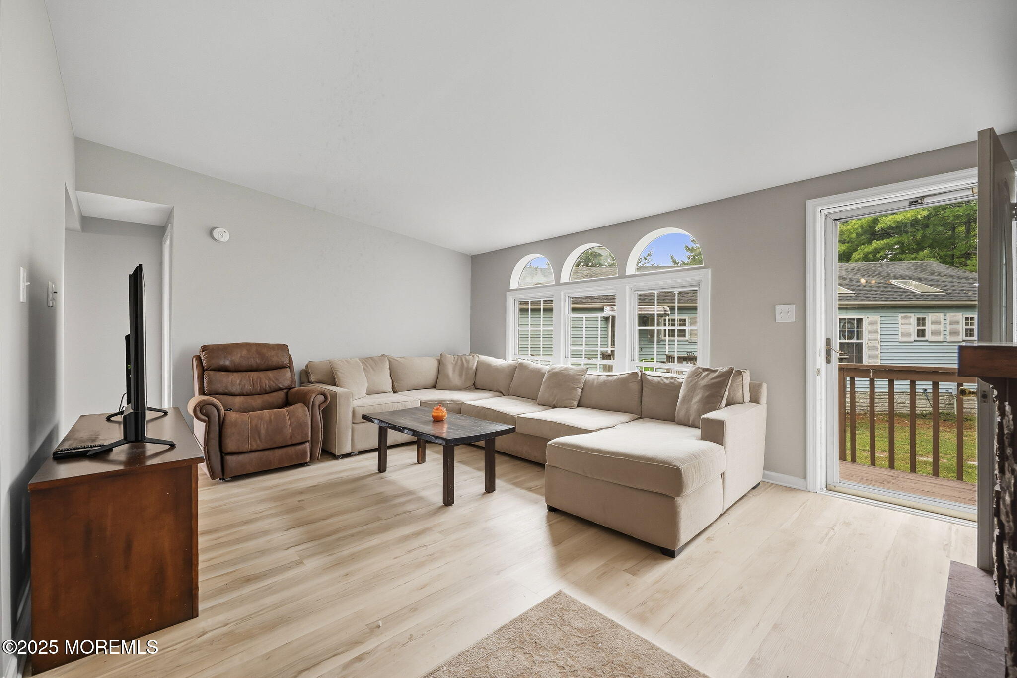 12 Alydar Court Howell, NJ 07731 - Photo 3 of 24 a living room with furniture and a flat screen tv