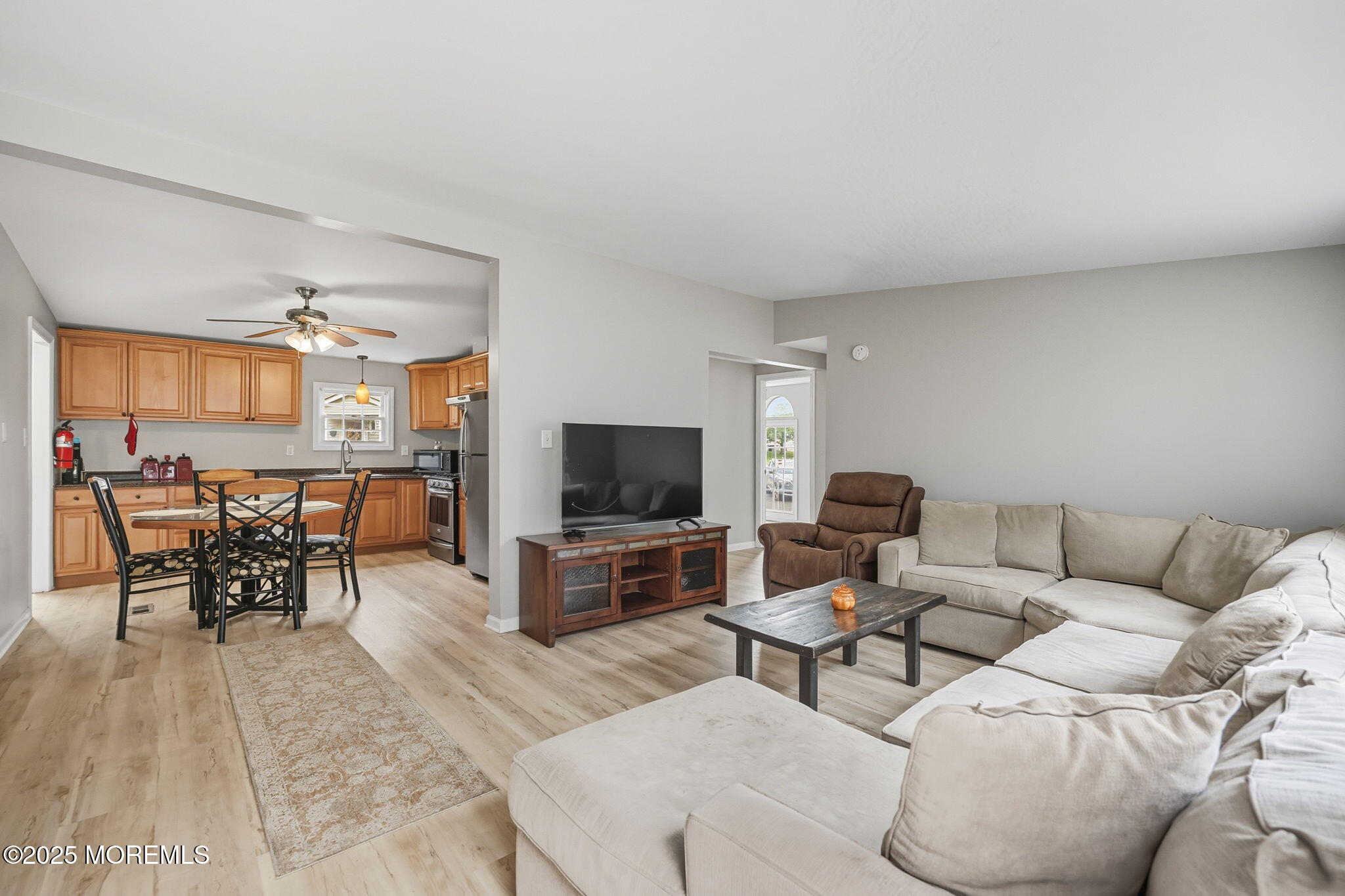 12 Alydar Court Howell, NJ 07731 - Photo 4 of 24 a living room with furniture and a flat screen tv