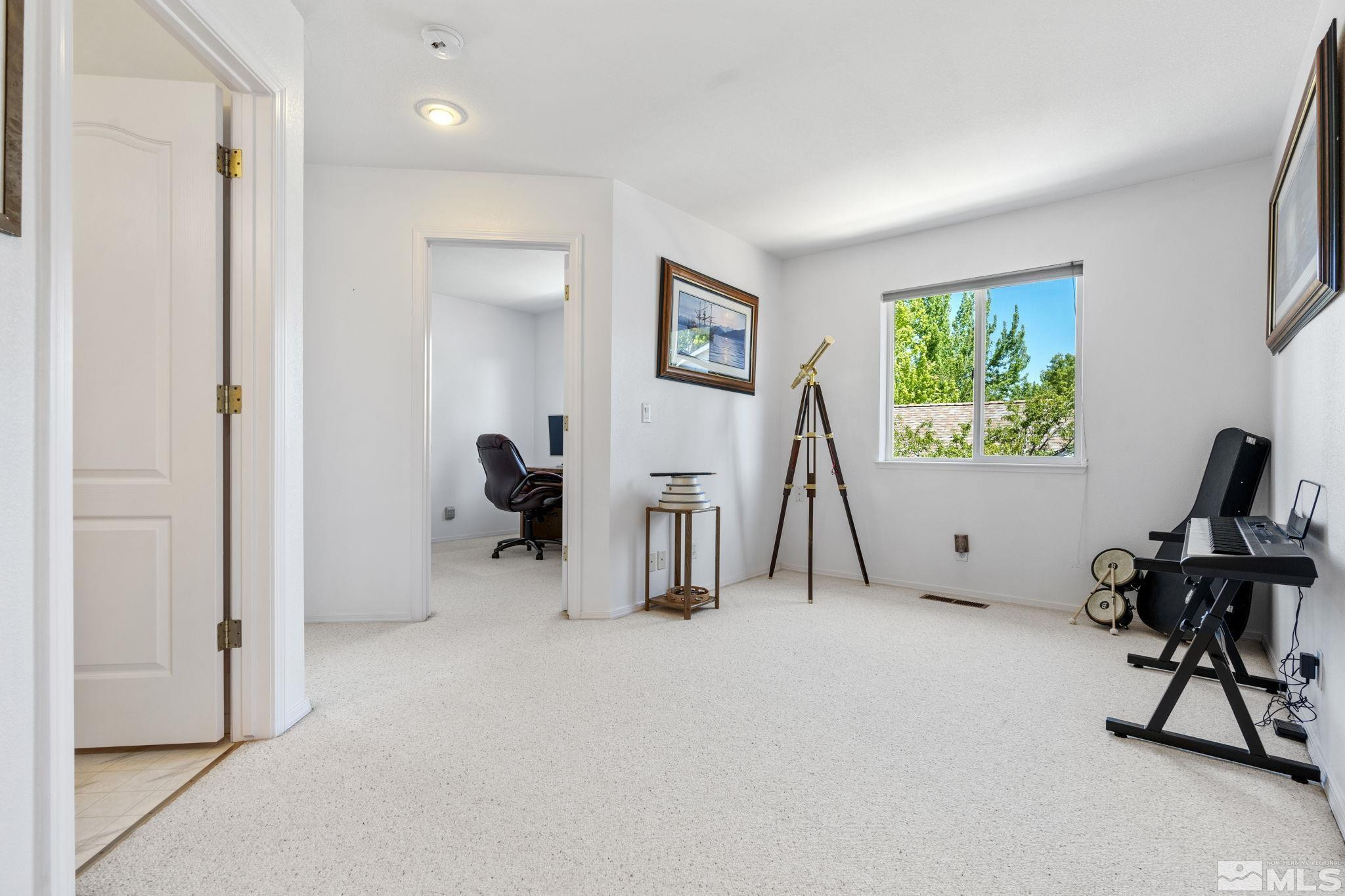 1348 Backer Way Reno, NV 89523 - Photo 21 of 40 a view of room with gym equipment and windows