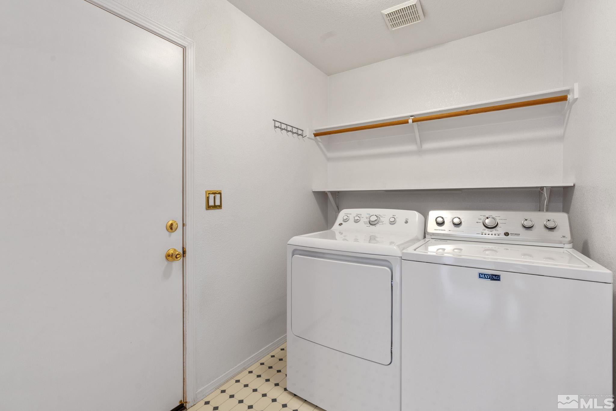 1348 Backer Way Reno, NV 89523 - Photo 30 of 40 a utility room with dryer and washer