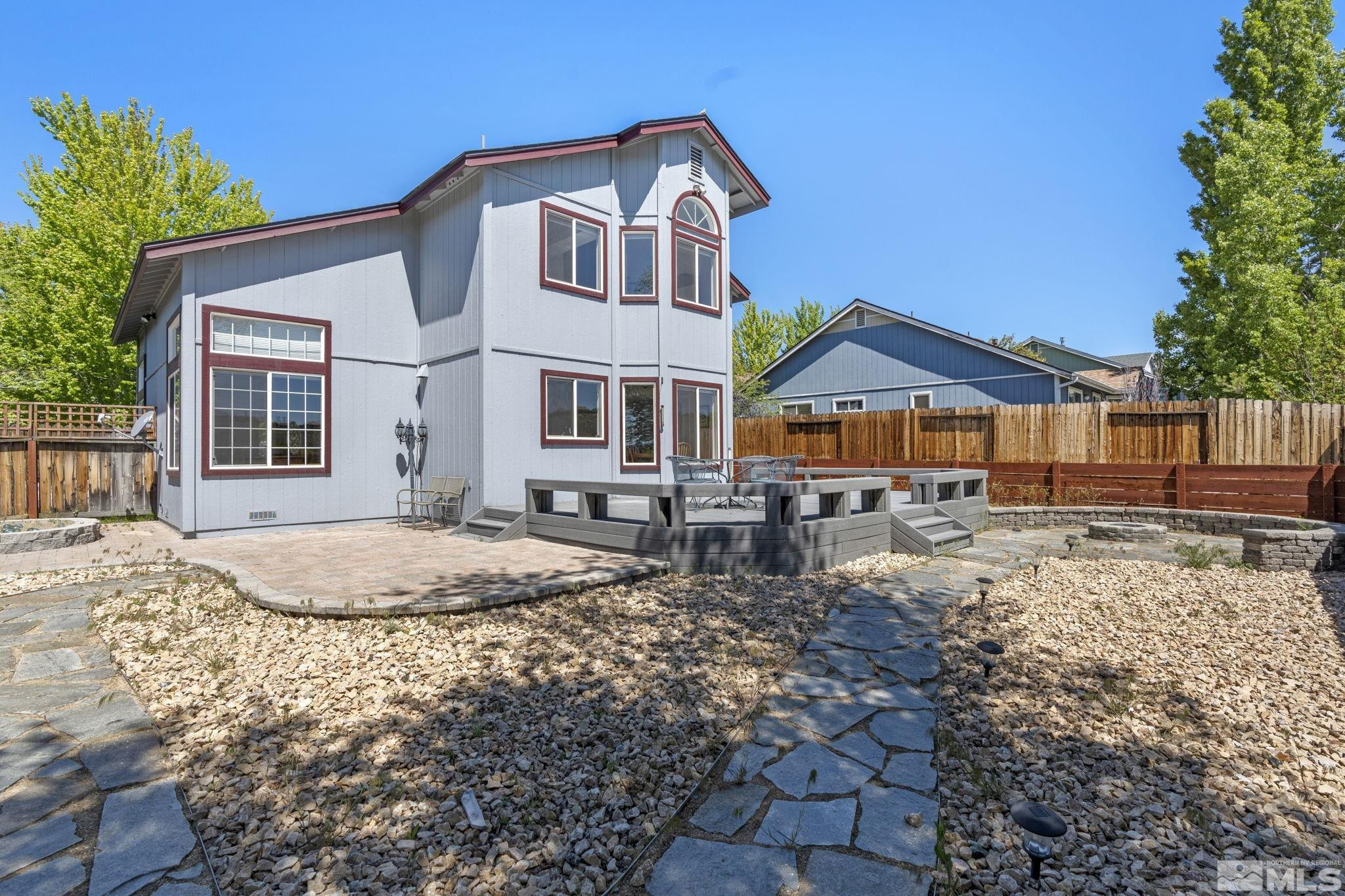 1348 Backer Way Reno, NV 89523 - Photo 32 of 40 a front view of a house with a yard