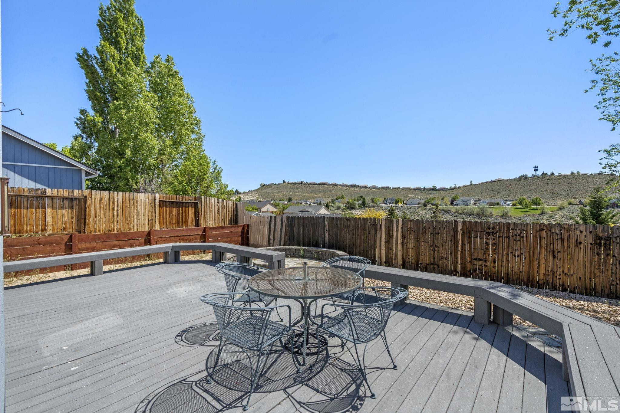 1348 Backer Way Reno, NV 89523 - Photo 34 of 40 a view of a chairs and table on the wooden floor