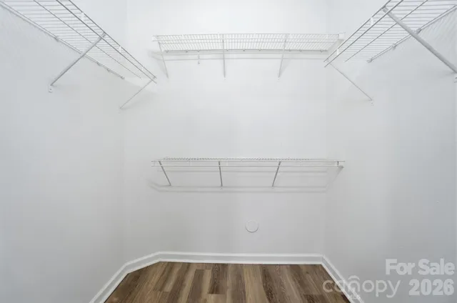 a view of a room with racks on the wall