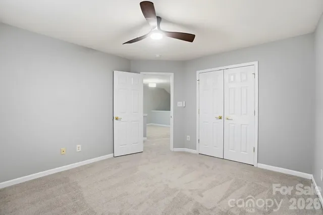 an empty room with a bathroom