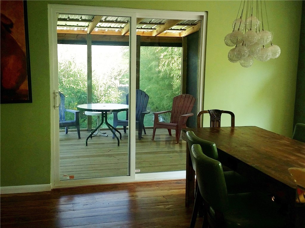 2307 B Riverside Farms Road Austin, TX 78741 - Photo 12 of 34 DINING CONNECTS TO COVERED PORCH