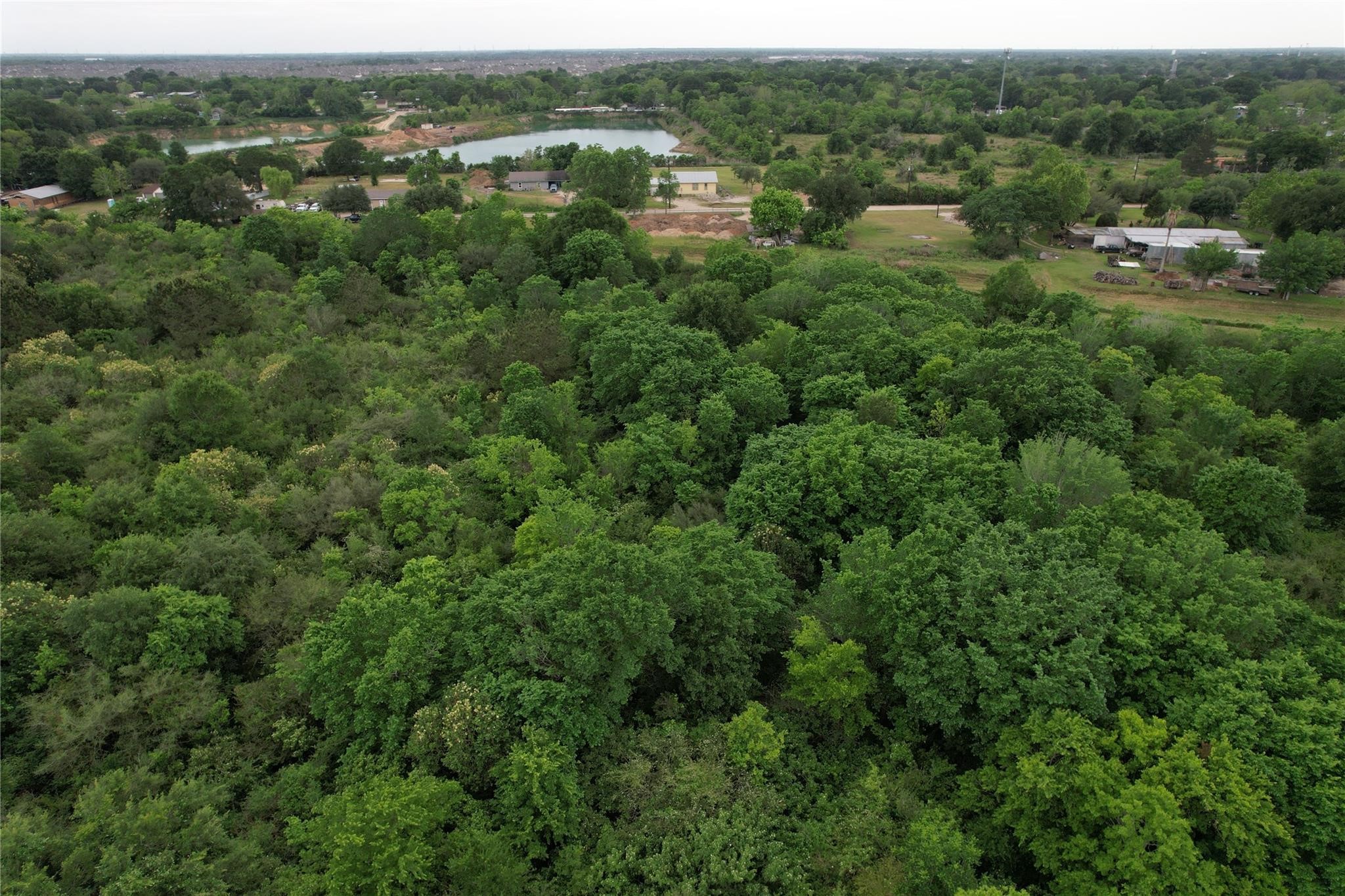 0 East Jasmine Street Fresno, TX 77545 - Photo 12 of 14 an aerial view of residential houses with outdoor and green space