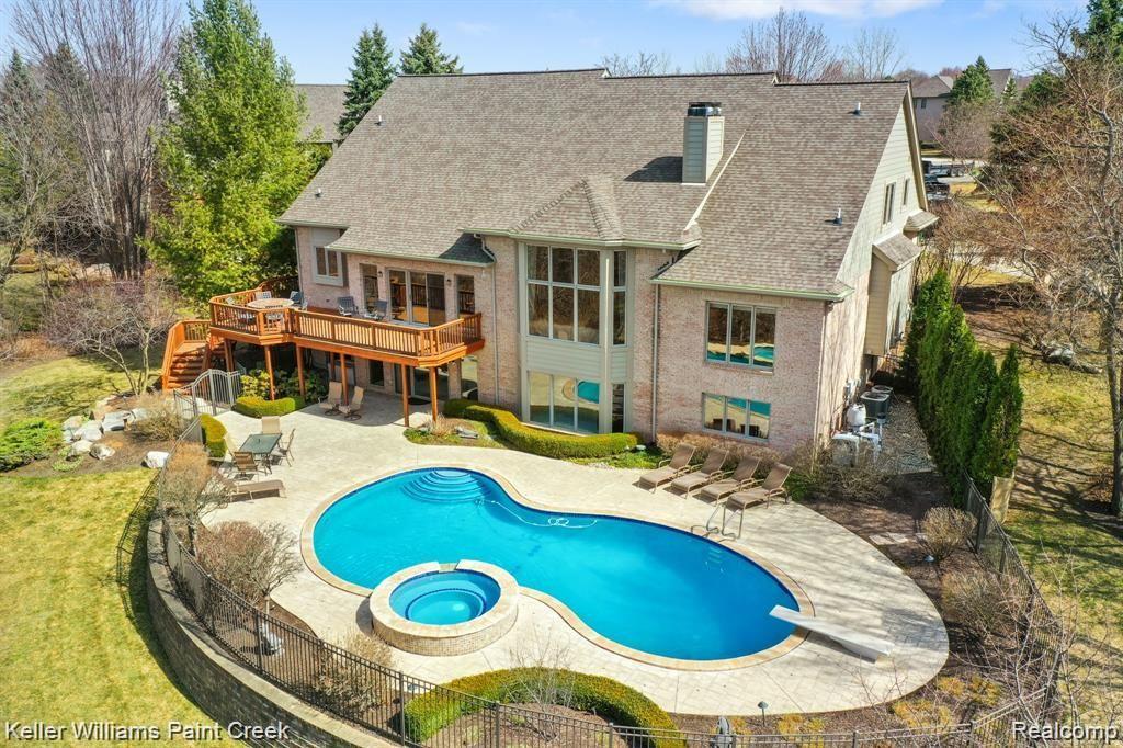 3599 Vineyard Springs Court Rochester, MI 48306 - Photo 18 of 62 High-end aluminum pool fence keeps everyone safe