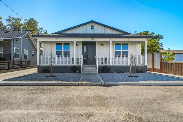front view of a house with a yard