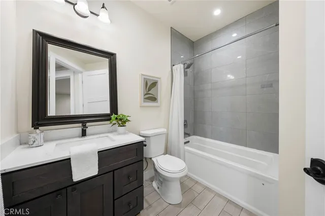 a front view of a house with a garage