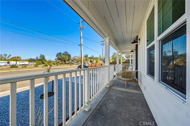 a view of a street from a balcony