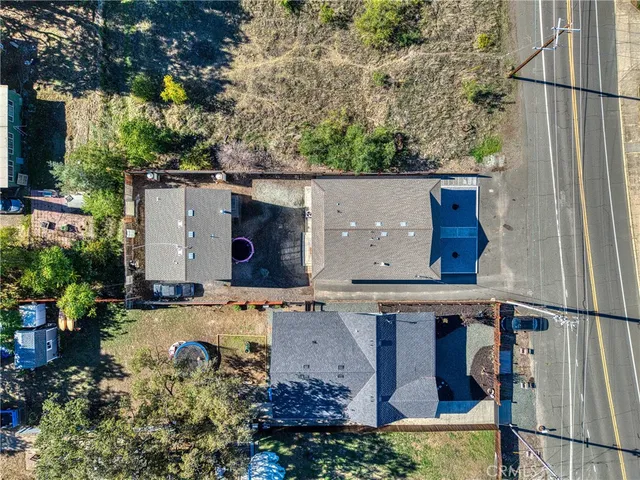 an aerial view of residential house with outdoor space
