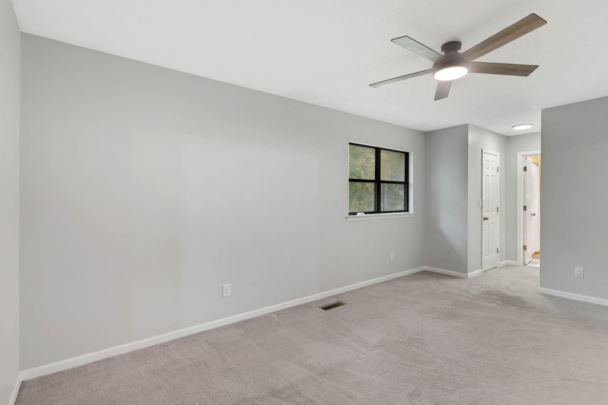 706 Swansons Ridge Road Chattanooga, TN 37421 - Photo 12 of 29 an empty room with ceiling fan and window