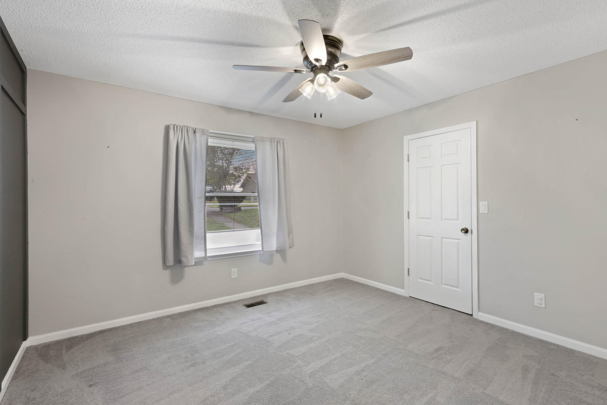706 Swansons Ridge Road Chattanooga, TN 37421 - Photo 15 of 29 wooden floor in an empty room with a window