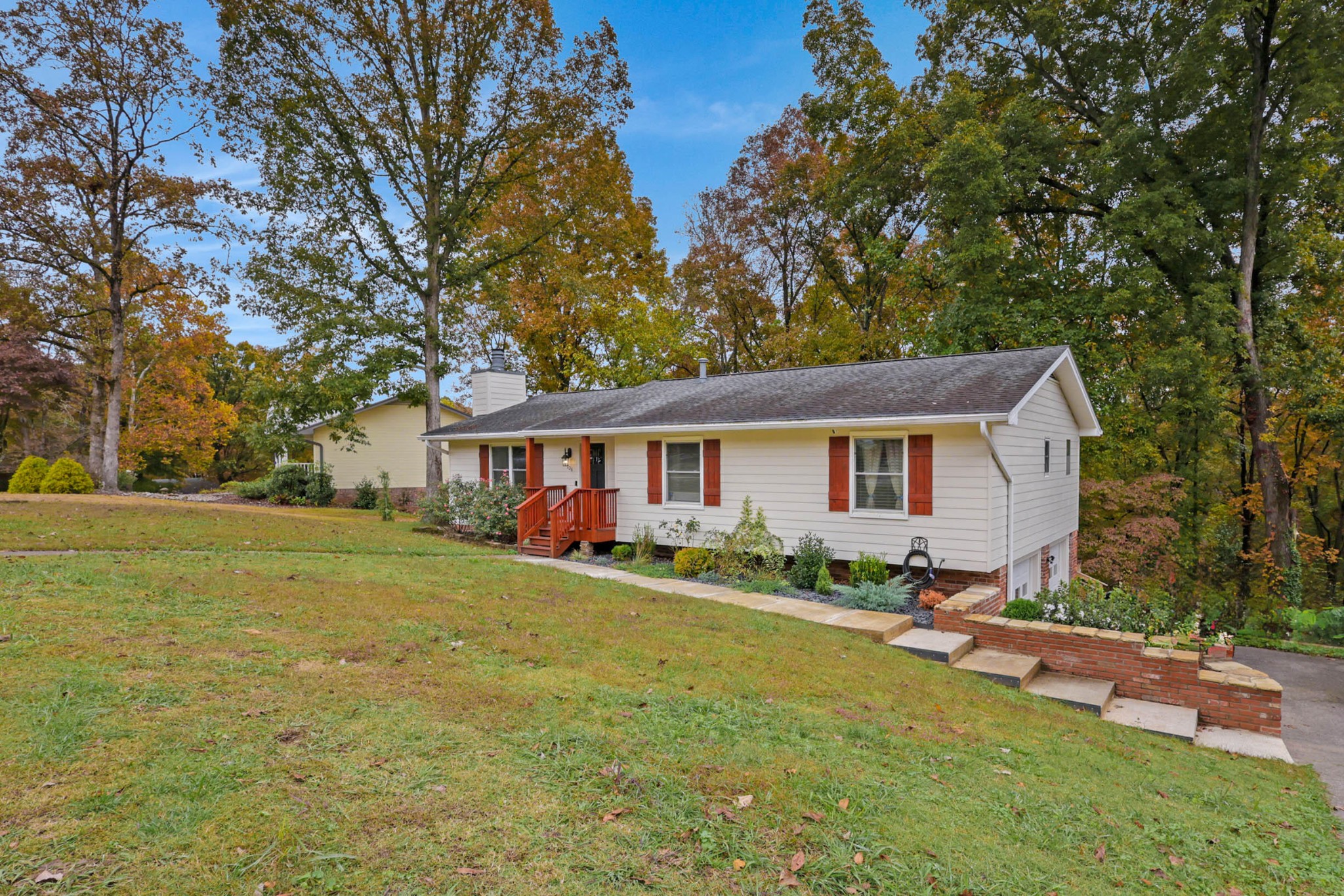 706 Swansons Ridge Road Chattanooga, TN 37421 - Photo 2 of 29 a view of a yard in front of a house with large tree