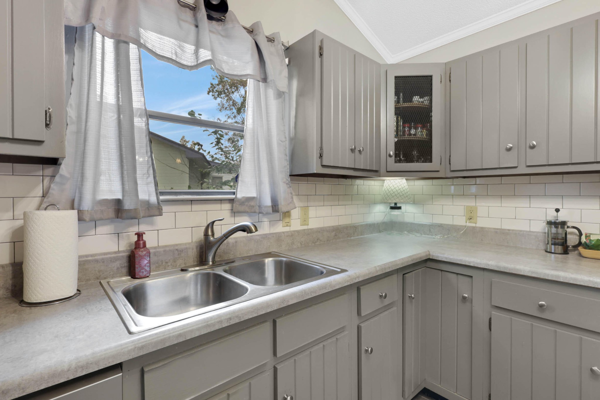 706 Swansons Ridge Road Chattanooga, TN 37421 - Photo 9 of 29 a kitchen with a sink and cabinets