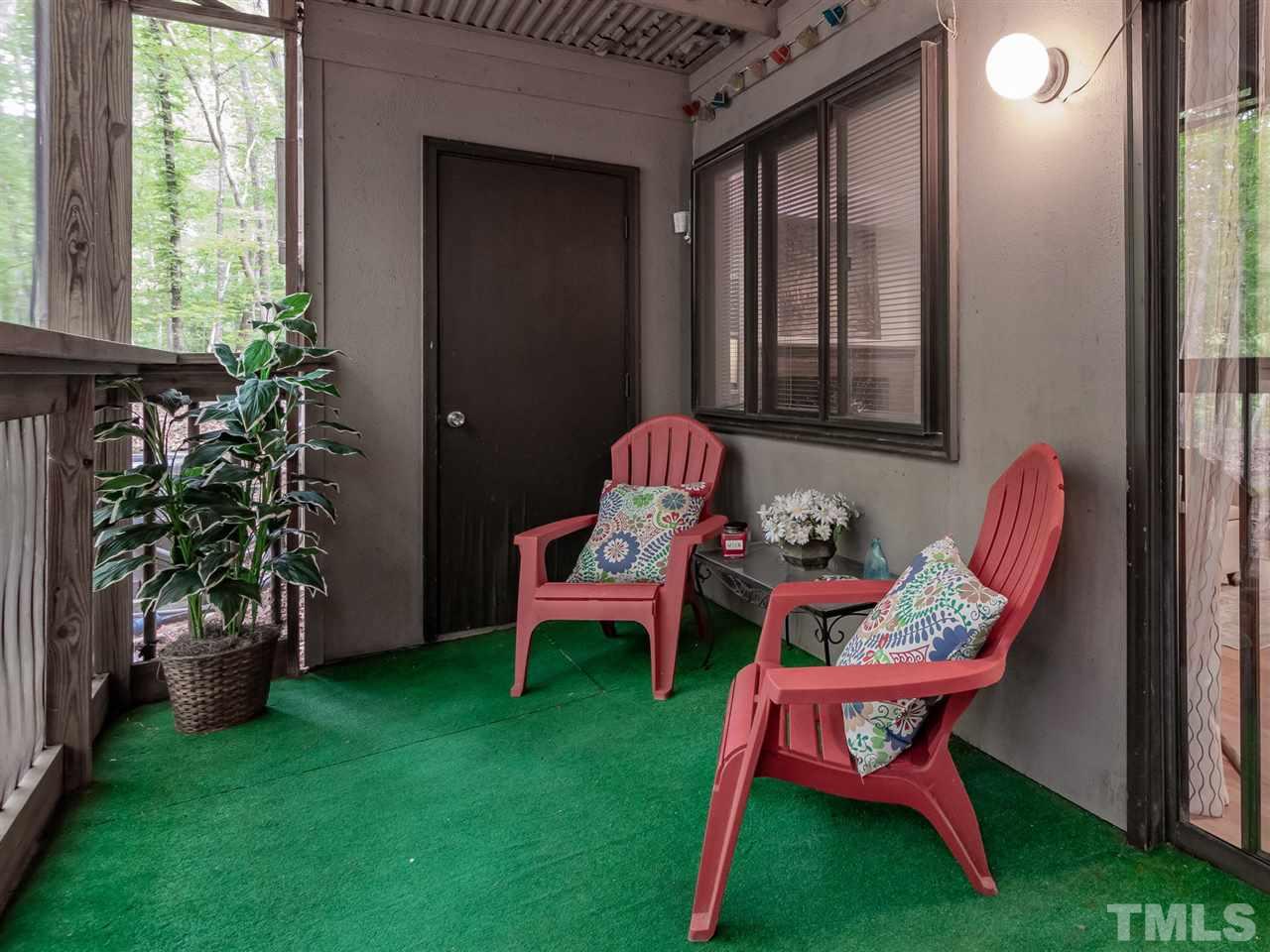 3086 Colony Road, Unit B Durham, NC 27705 - Photo 19 of 27 a backyard of a house with table and chairs
