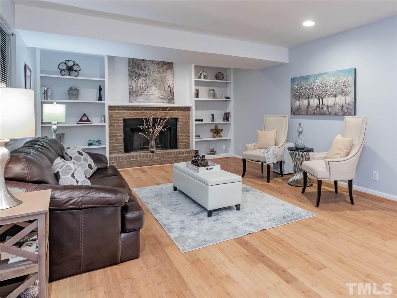 3086 Colony Road, Unit B Durham, NC 27705 - Photo 7 of 27 a living room with furniture and a fireplace