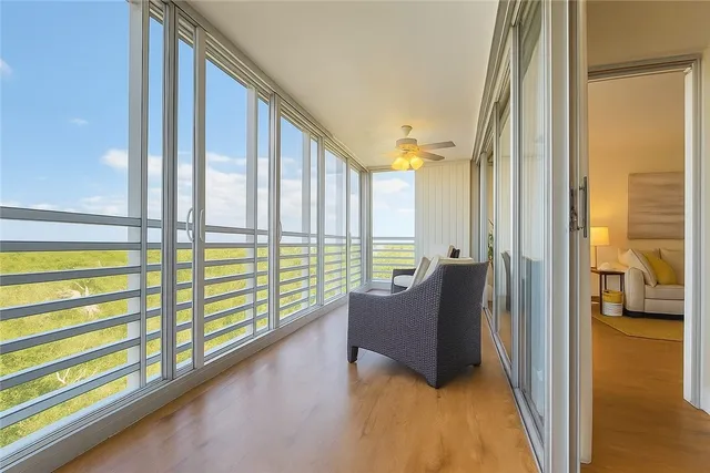 a view of a large room with windows