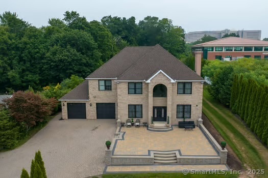 a view of house with yard outdoor seating and entertaining space