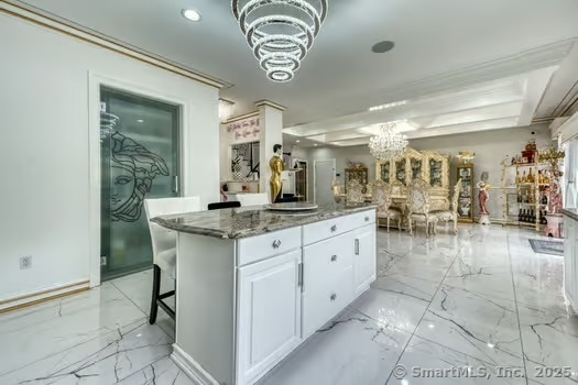 93 South Road Farmington, CT 06032 - Photo 15 of 40 a kitchen with a sink and cabinets