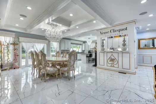 93 South Road Farmington, CT 06032 - Photo 26 of 40 a view of a big room with chandelier fan and windows