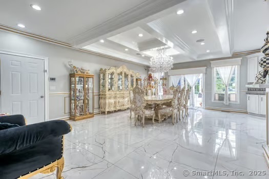 93 South Road Farmington, CT 06032 - Photo 28 of 40 a living room with furniture and a table