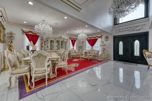 93 South Road Farmington, CT 06032 - Photo 7 of 40 a living room with stainless steel appliances kitchen island granite countertop furniture and a fireplace