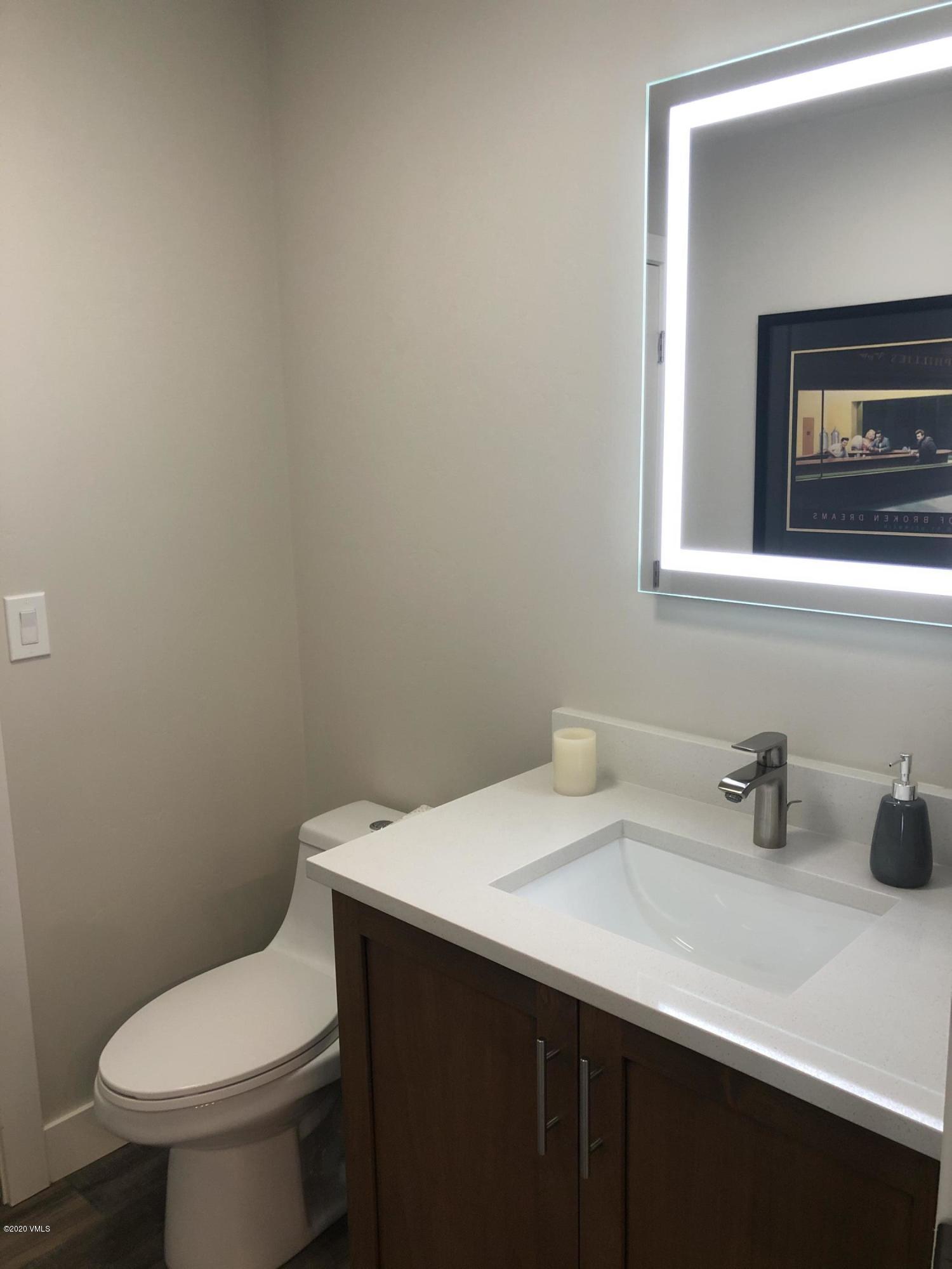 316 Wall Street, Unit 6 Eagle, CO 81631 - Photo 13 of 30 a bathroom with a sink and a toilet