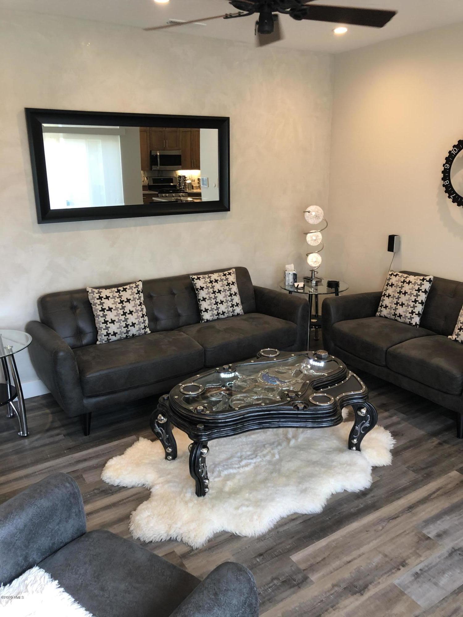 316 Wall Street, Unit 6 Eagle, CO 81631 - Photo 5 of 30 a living room with furniture and a wooden floor