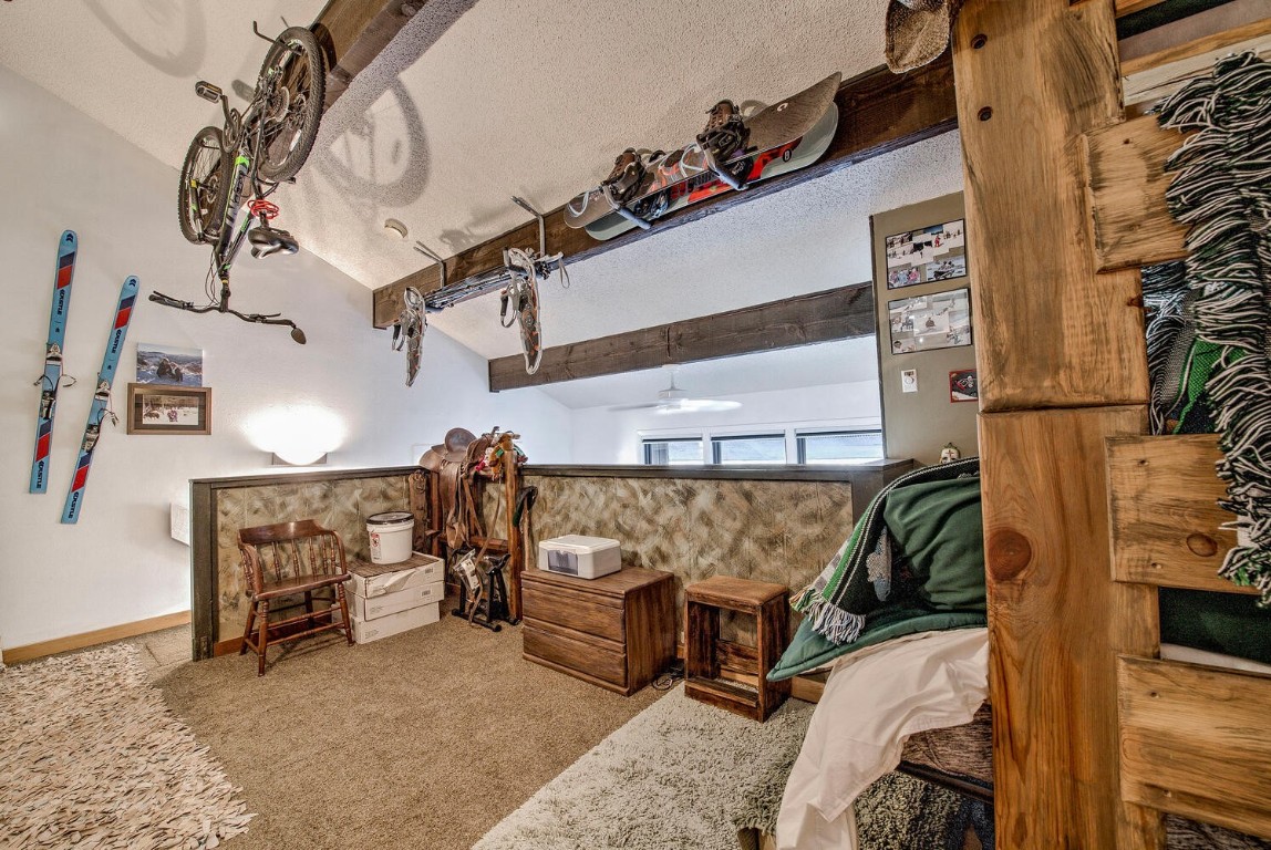 78 Guller Road, Unit 201 Copper Mountain, CO 80443 - Photo 21 of 41 a view of a livingroom with furniture and a fireplace