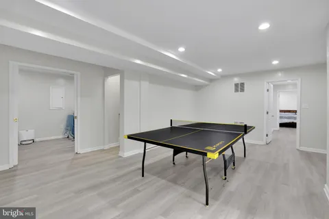 a room with furniture and wooden floor