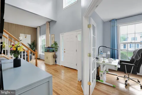 a view of a living room and dining room