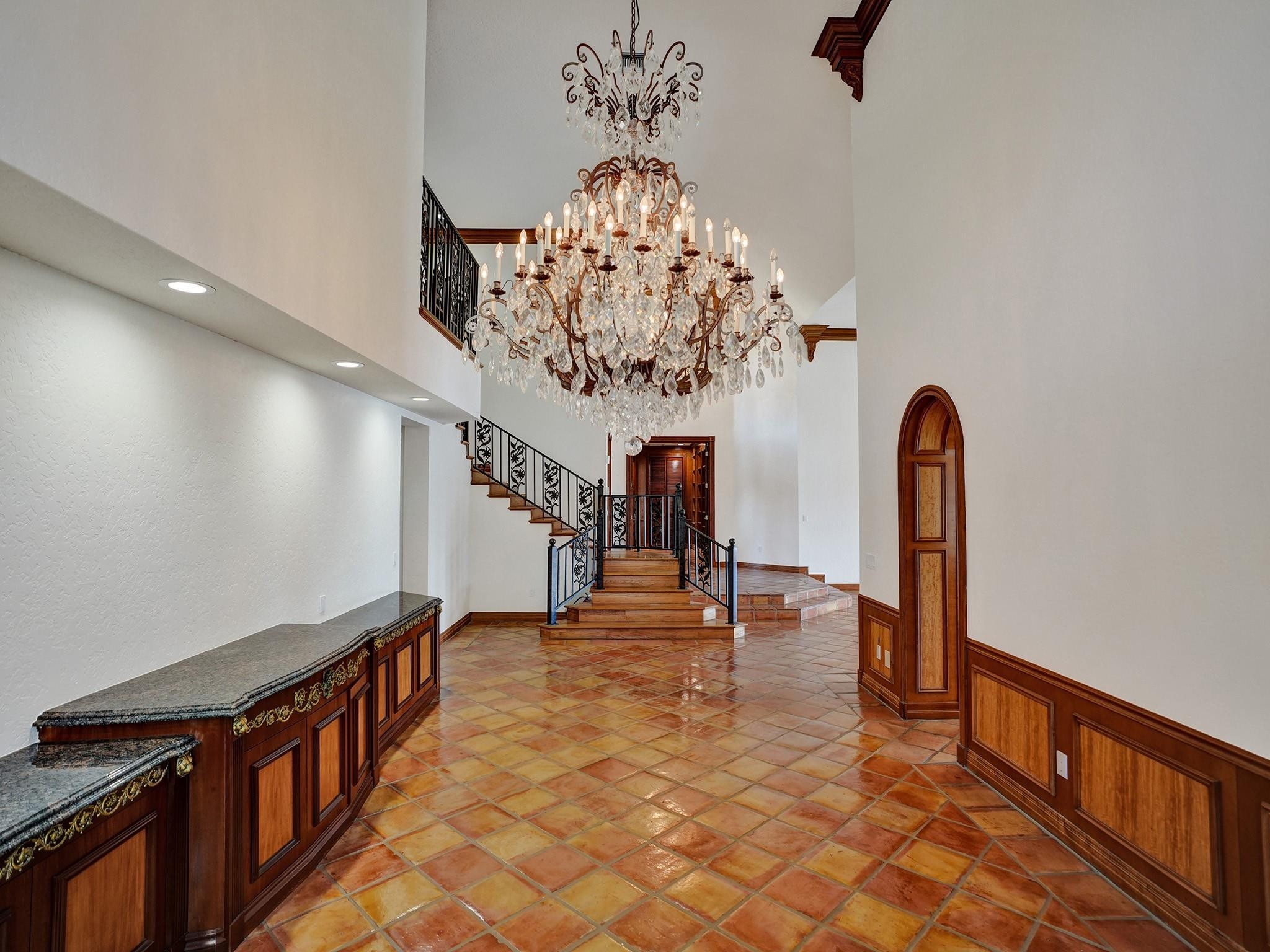 21 Saranac Road Sea Ranch Lakes, FL 33308 - Photo 9 of 35 a view of a chandelier and entryway