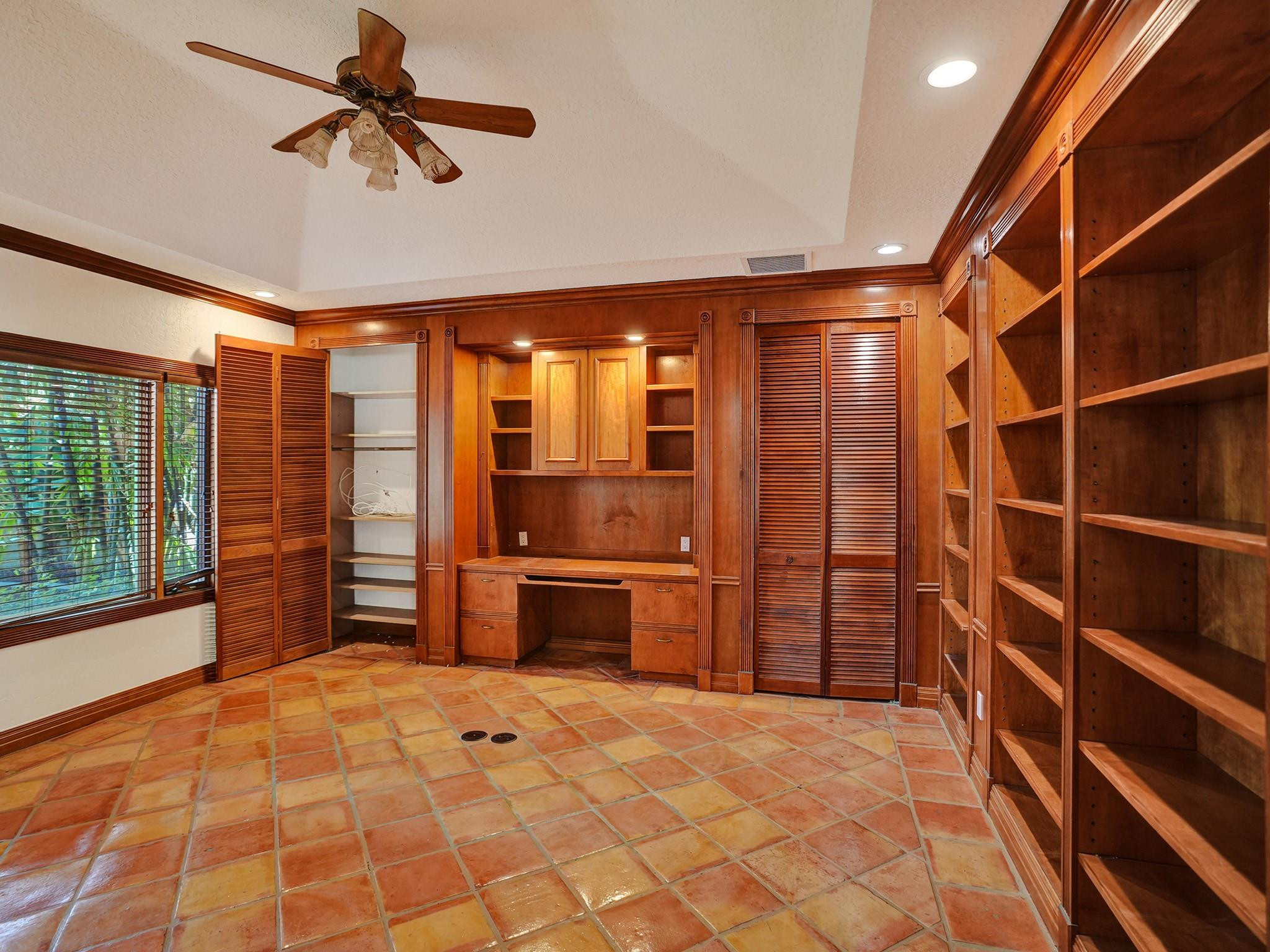 21 Saranac Road Sea Ranch Lakes, FL 33308 - Photo 10 of 35 a room with closet and windows