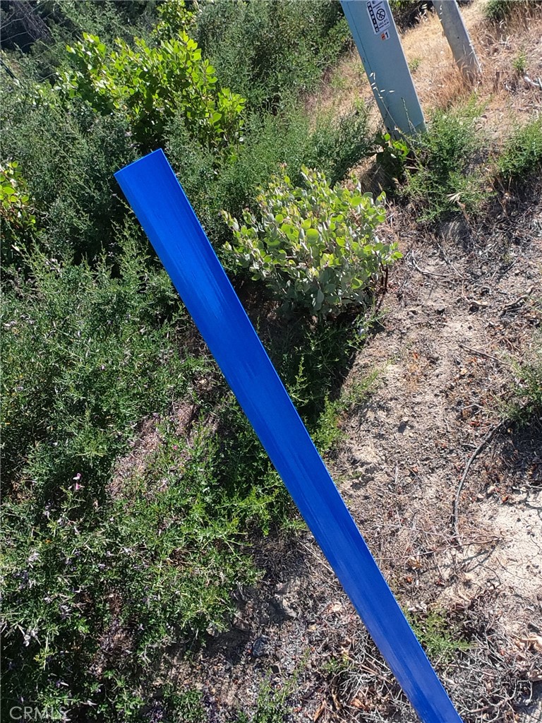 13627 View Road Cobb, CA 95426 - Photo 26 of 27 a view of a yard with a wooden bench