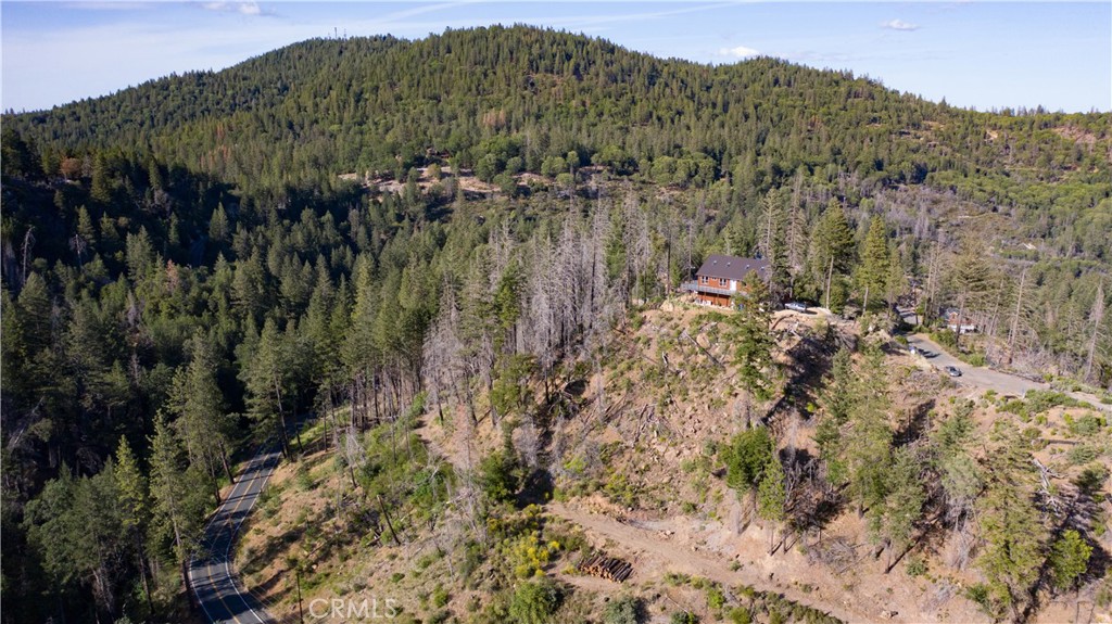 13627 View Road Cobb, CA 95426 - Photo 6 of 27 a view of a house with a mountain and trees