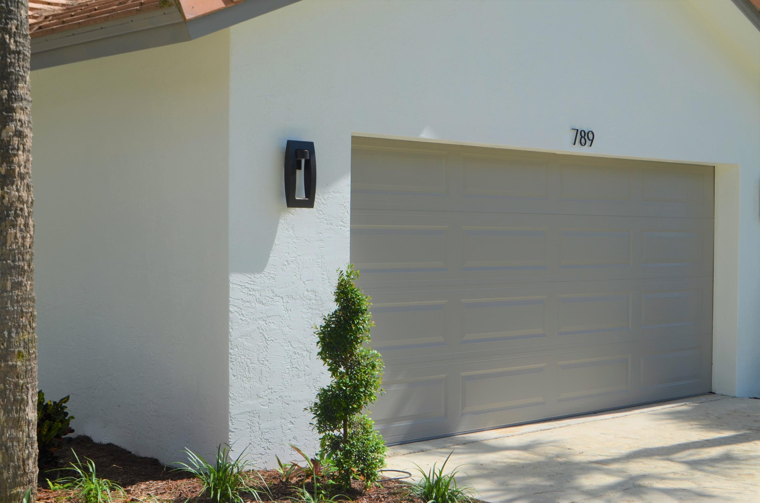 789 Camino Lakes Circle Boca Raton, FL 33486 - Photo 38 of 42 Impact Garage