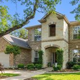front view of a house with a small yard