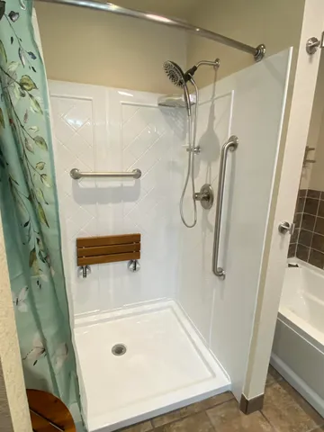 a bathroom with a sink and a shower