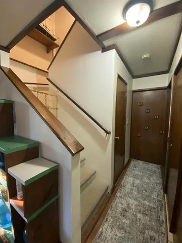 a view of storage and utility room with a sink