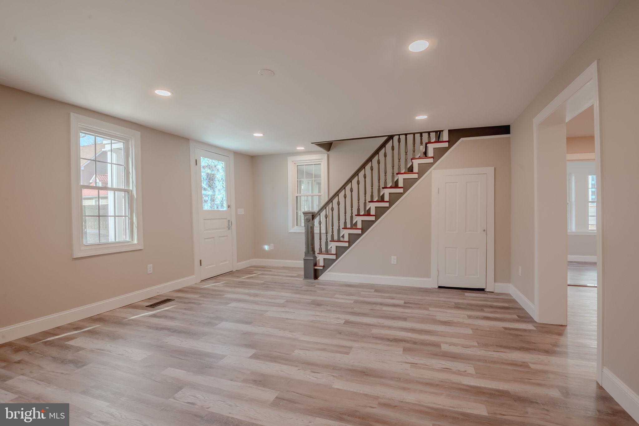 319 Union Street Milton, DE 19968 - Photo 20 of 61 a view of an entryway with wooden floor