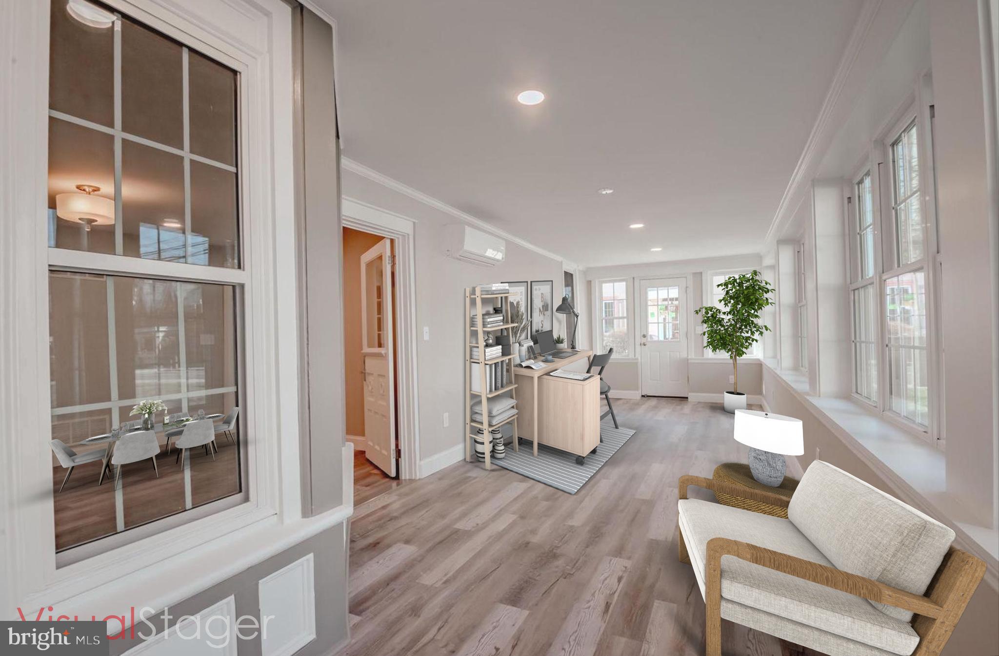 319 Union Street Milton, DE 19968 - Photo 24 of 61 a living room with furniture and a large window