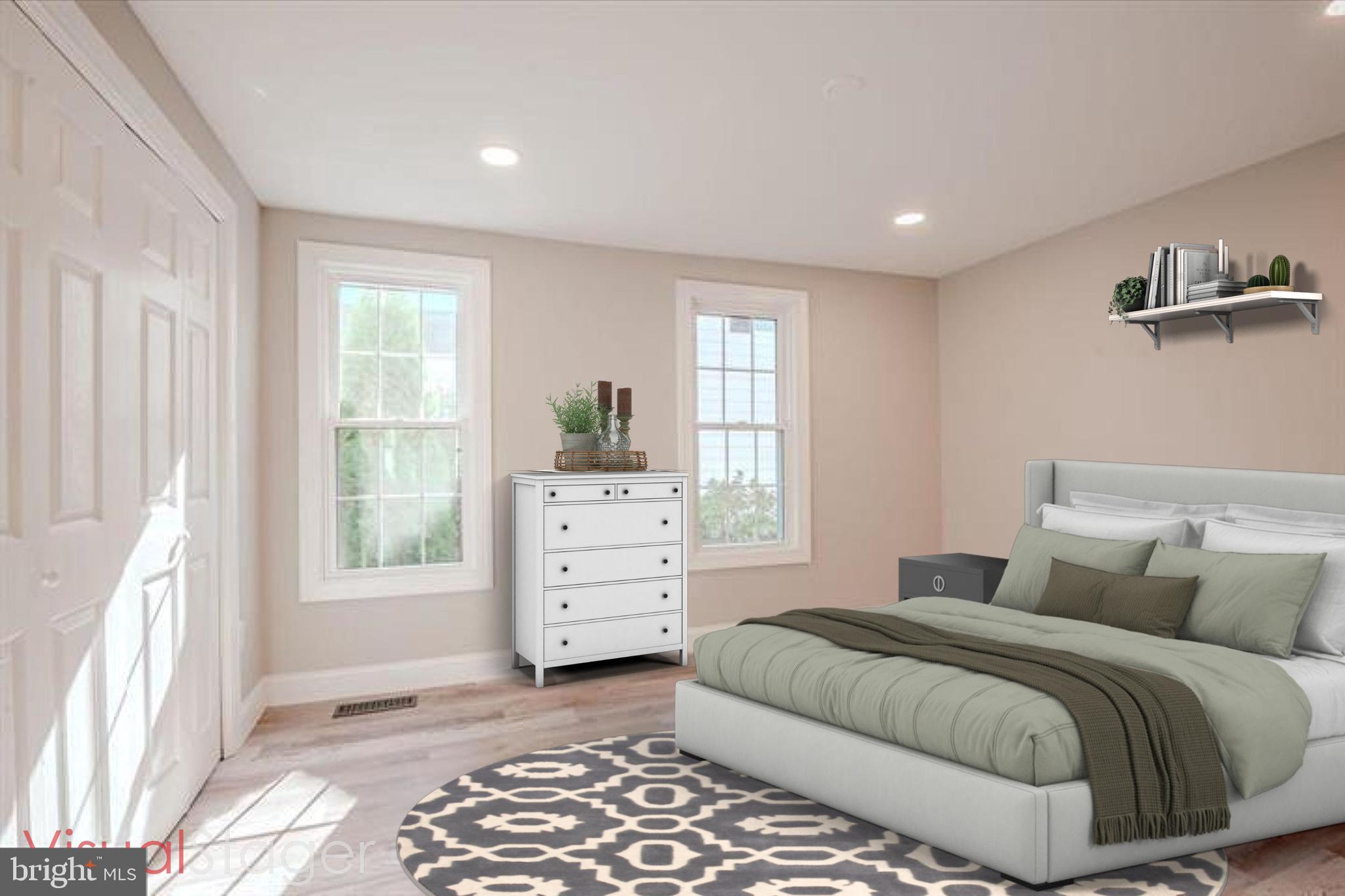 319 Union Street Milton, DE 19968 - Photo 27 of 61 a bedroom with a bed and a window