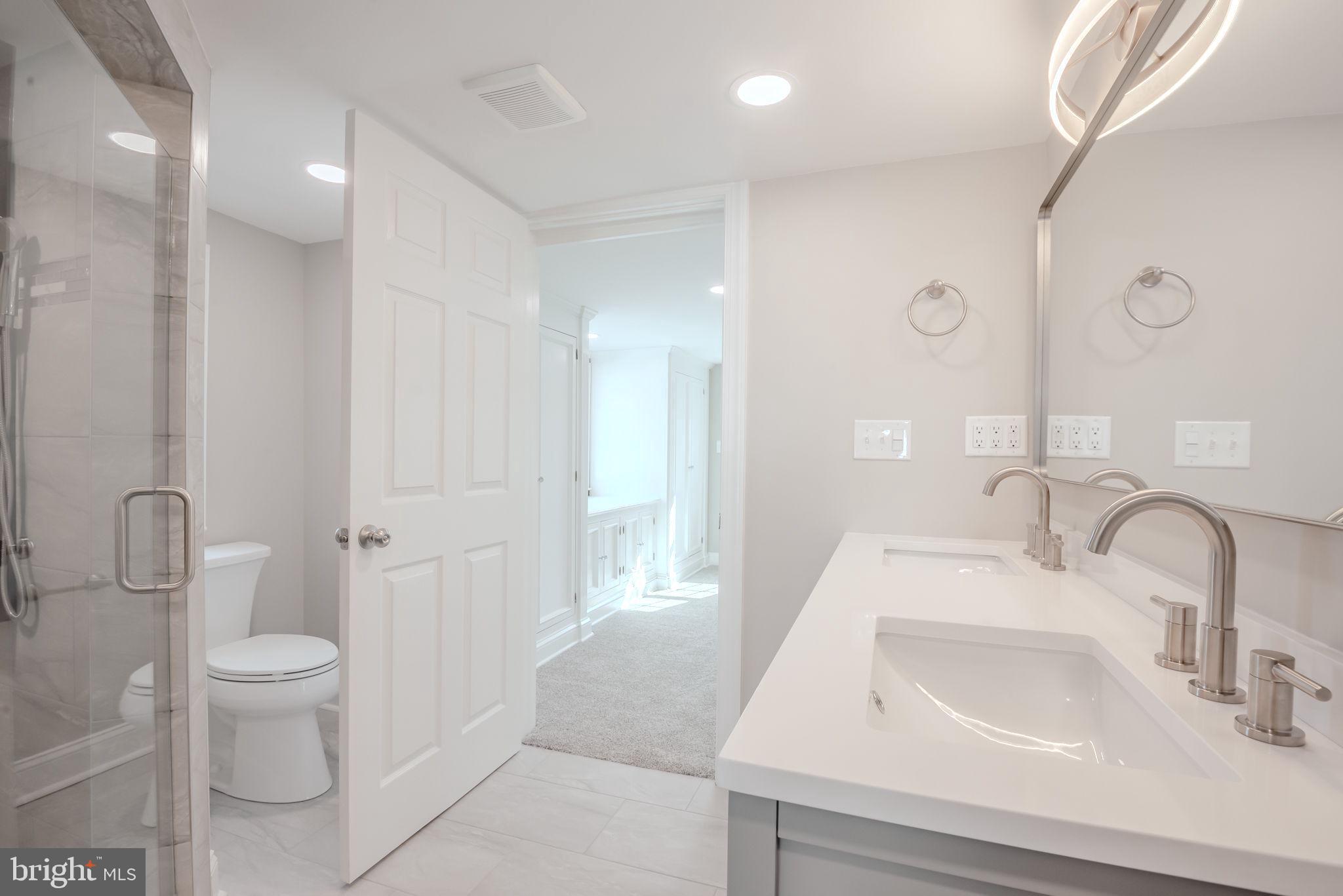 319 Union Street Milton, DE 19968 - Photo 40 of 61 a bathroom with a sink toilet and shower